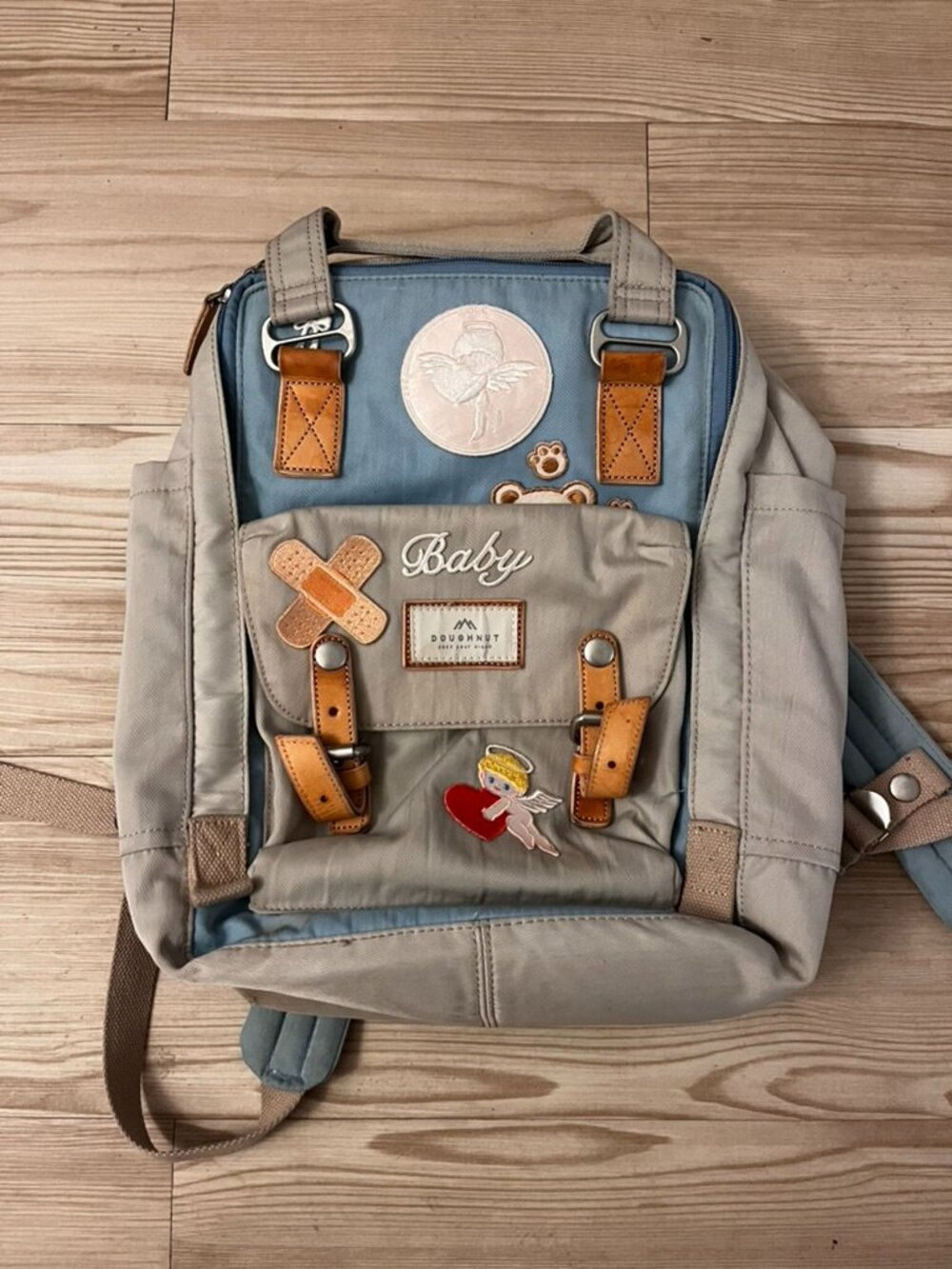doughnut backpack with embroidered patches